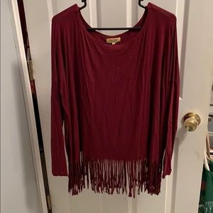 Barely worn piko with fringe